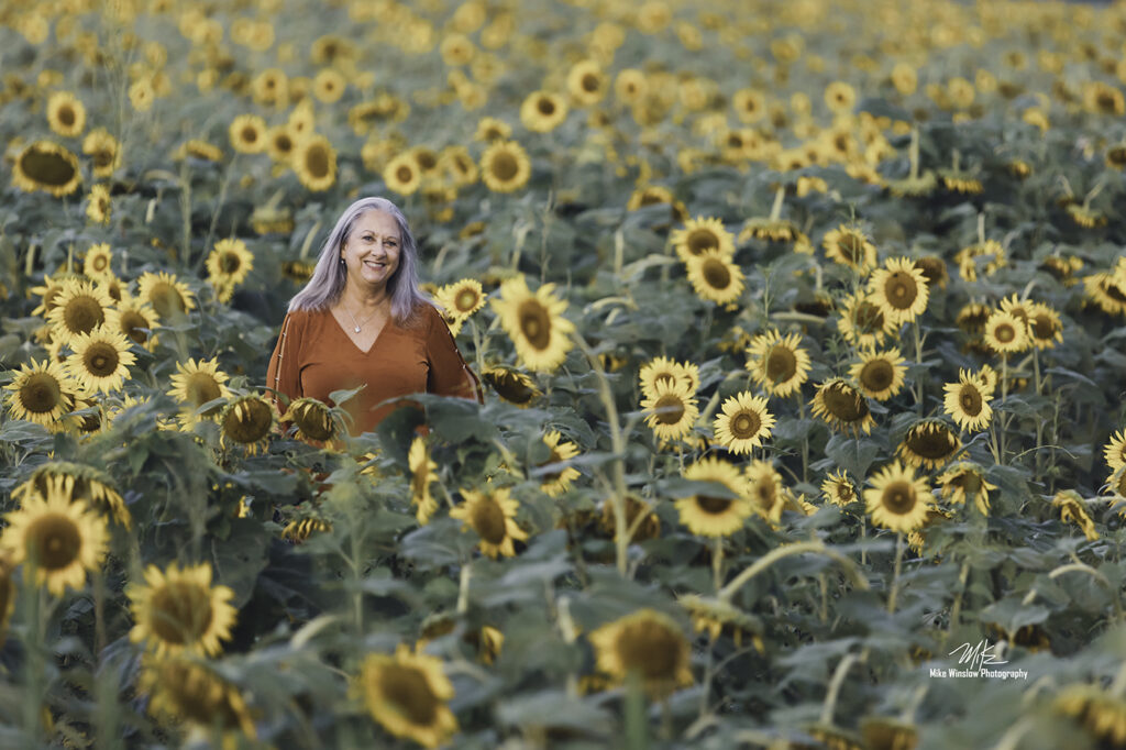 woman in sunflower field