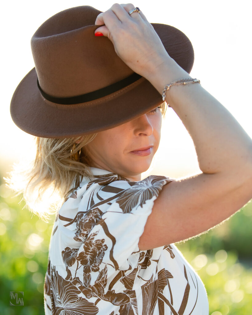 woman tipping her hat