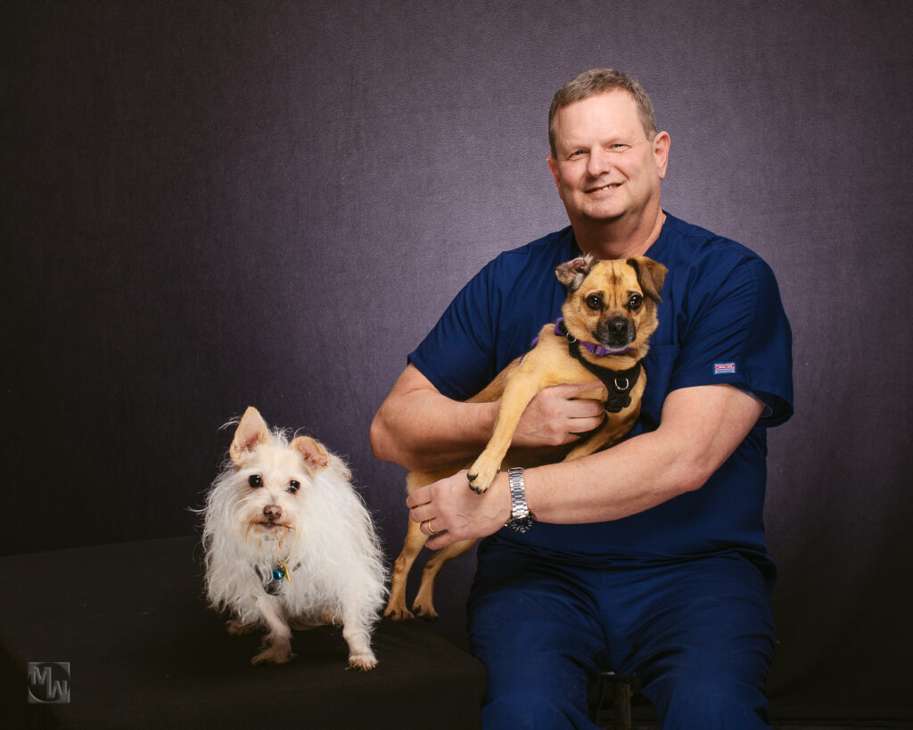 Veterinarian with 2 dogs